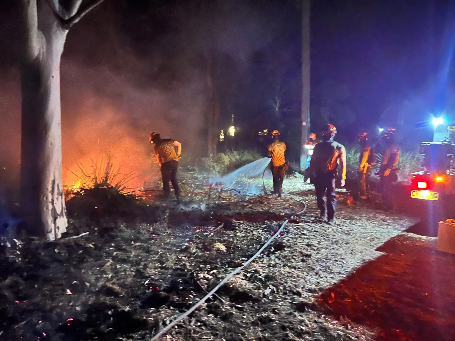 Traccorp crew working a prescribed burn at night