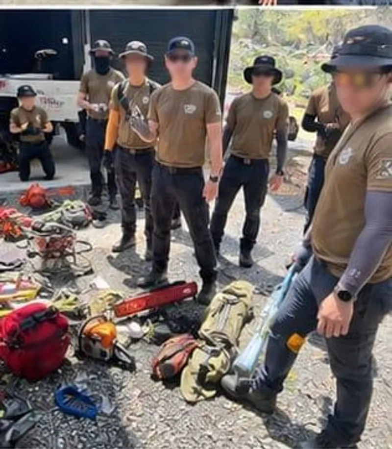 Wildfire hand tools, chainsaws and packs laid out for an equipment familiarisation session